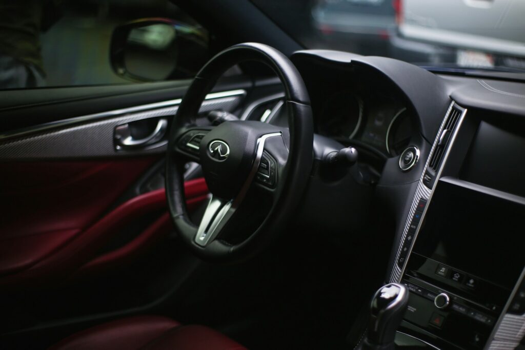 black and silver mercedes benz steering wheel